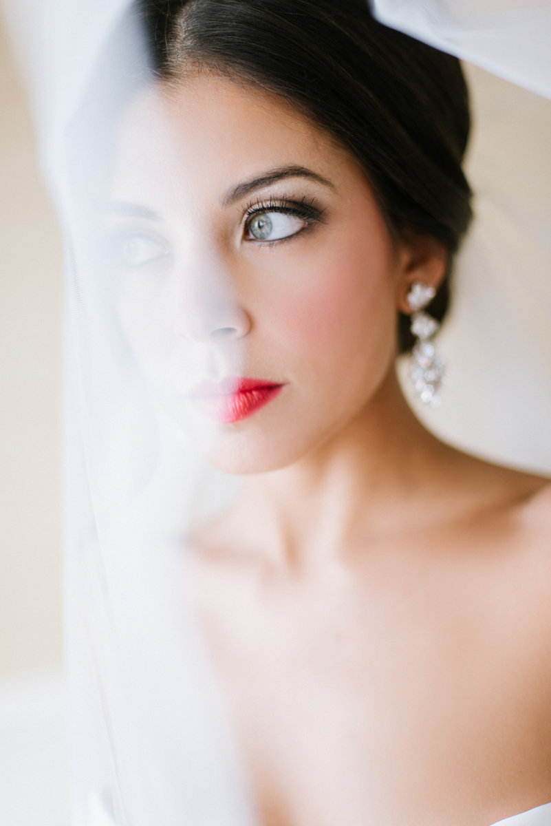 elegant classy bride wearing red lipstick