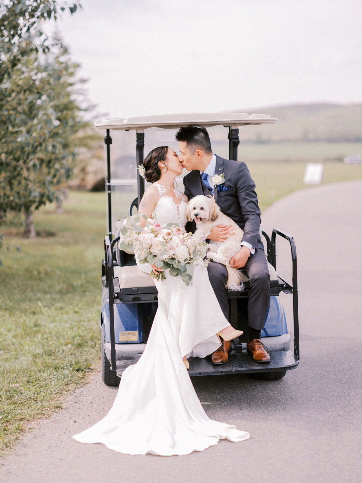 wedding-couple-golf-cart-kiss-calgary-alberta