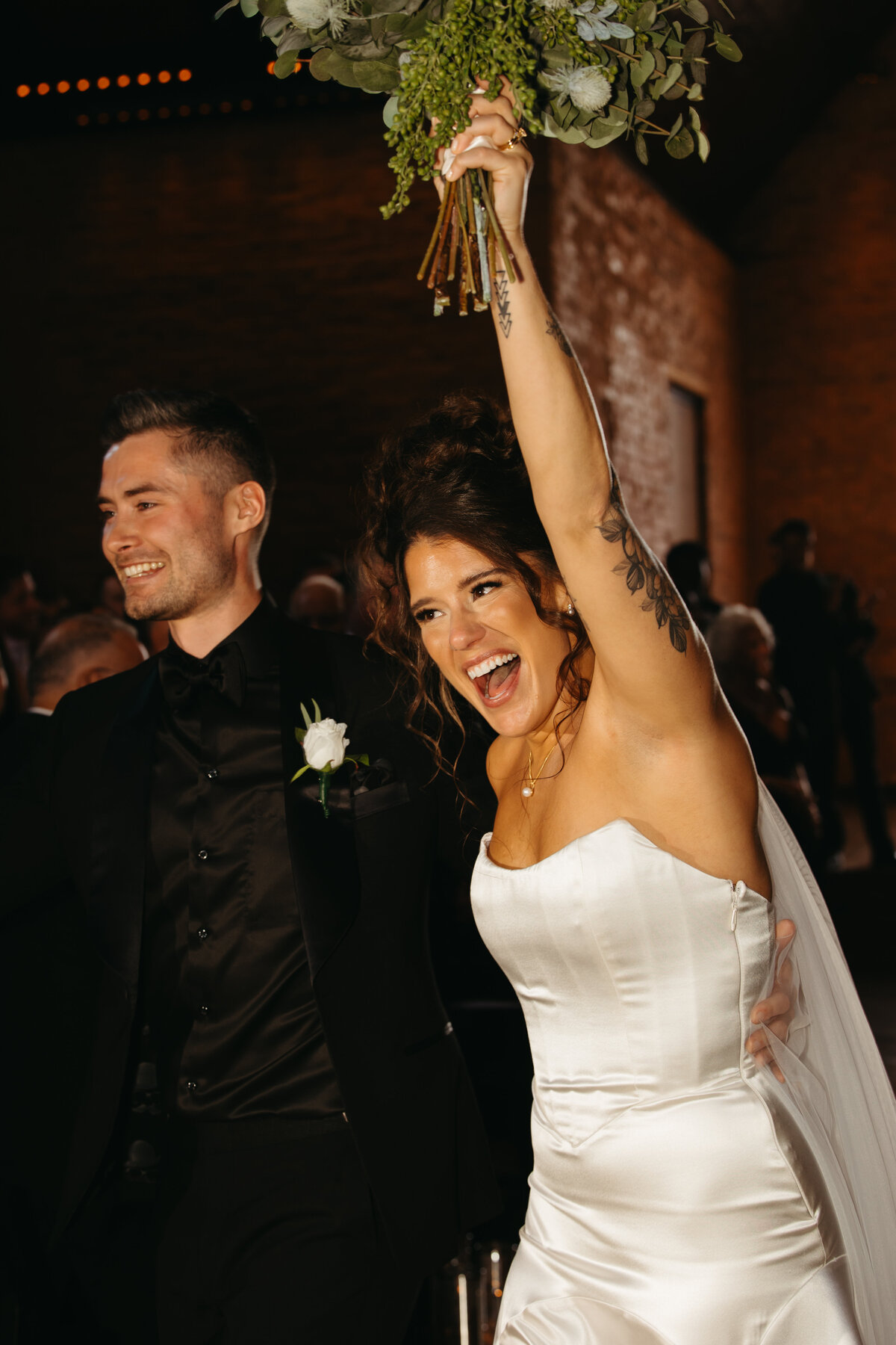 couple walks down aisle after getting married