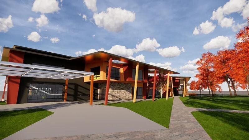 Perspective view of the new campus buildings at St Gabriel School, featuring covered walkways and landscaped grounds.