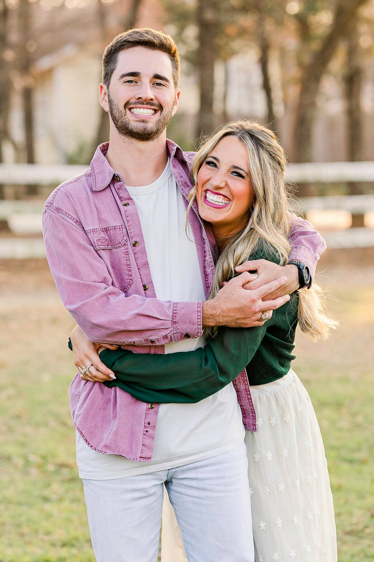 young-adult-brohter-and-sister-share-a-hug-in-green-acres-park