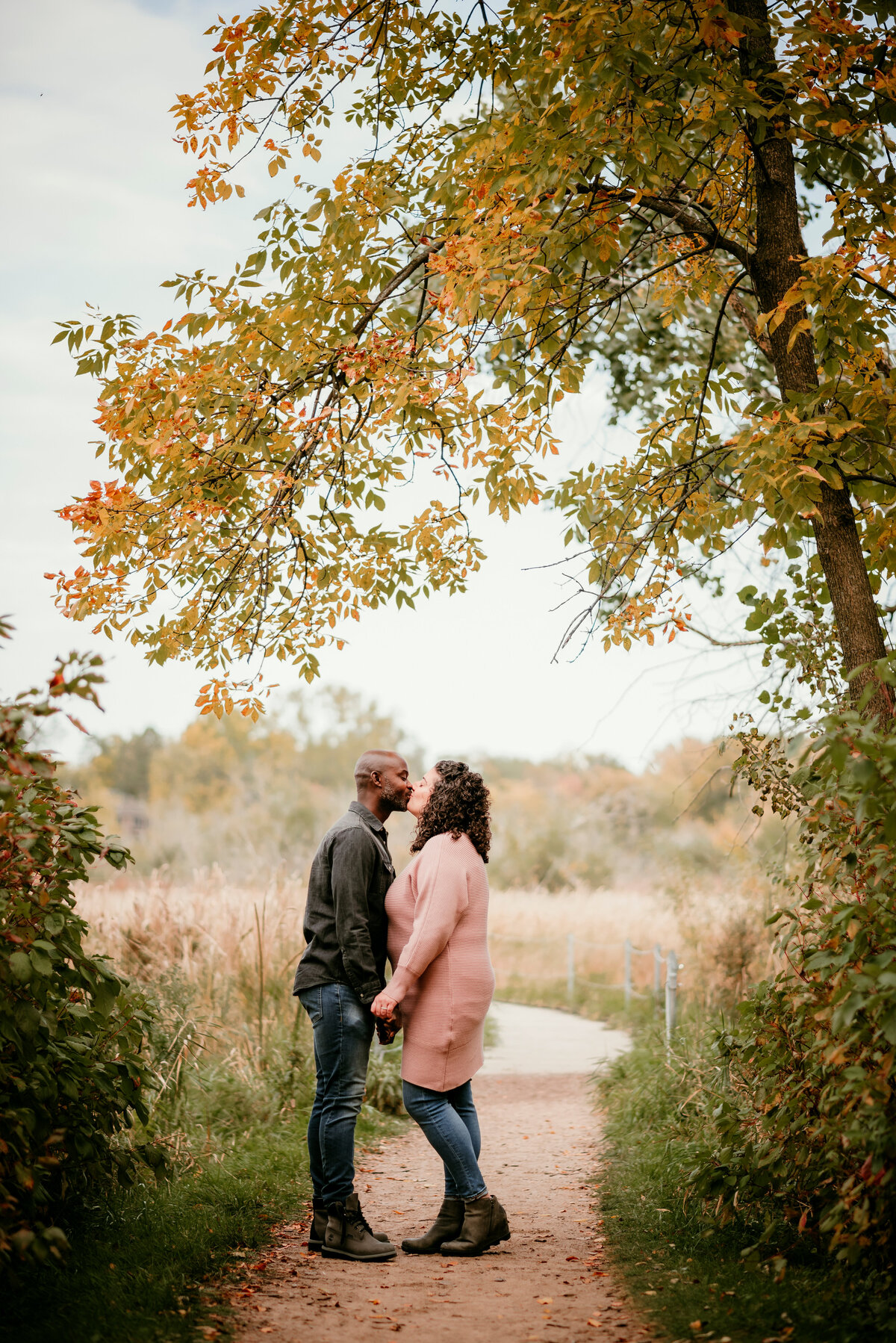 Share trailside tales in your family portraits in St. Paul and Minneapolis. Shannon Kathleen Photography frames your joy against the winding paths of wooded trails. Book now for trailside memories.