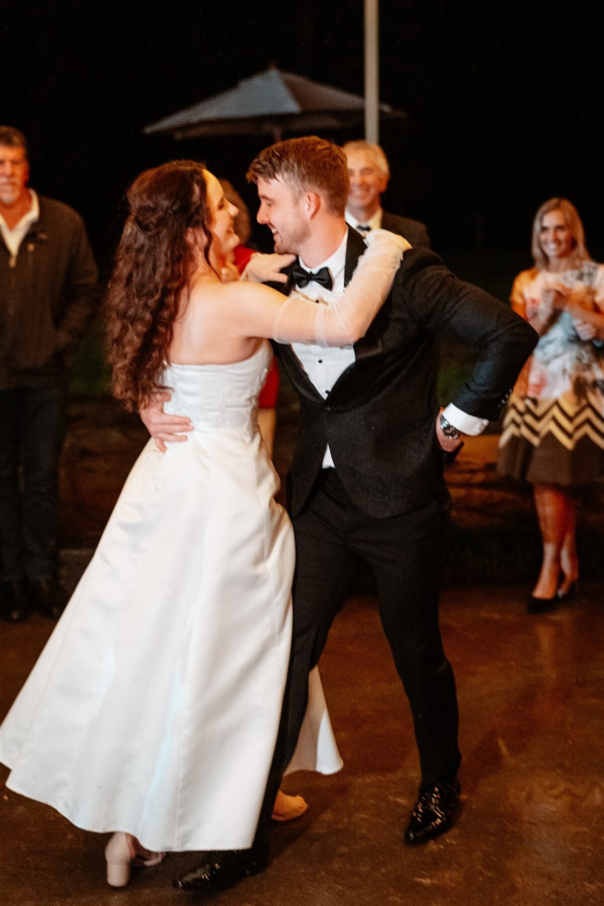 A joyous wedding reception filled with lively dancing and cherished moments shared with family and friends.