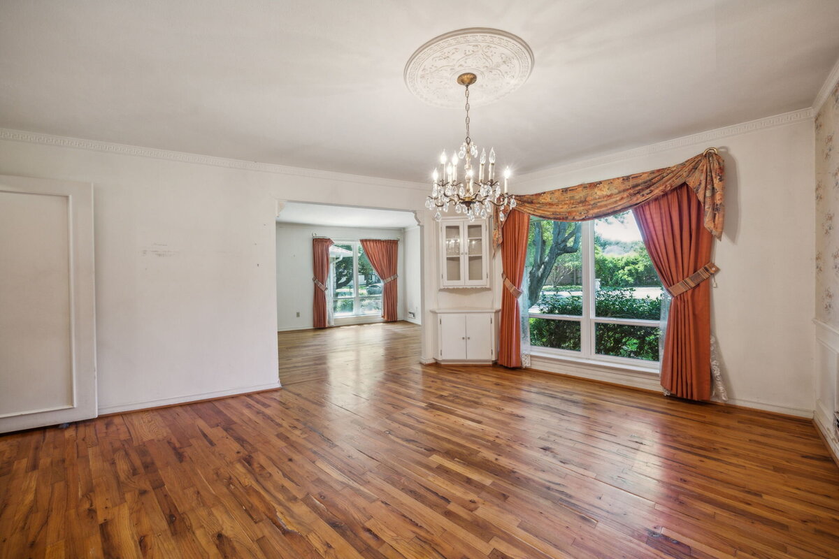 14214_edgecrest_dr_dallas_tx_formal_dining_room_-classic_dining_space_with_crystal_chandelier_and_large_bay_window-_haven_realty_group