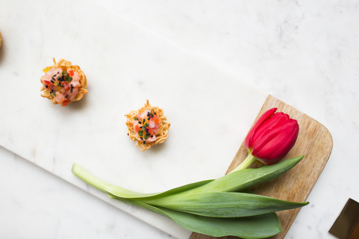 chili lime shrimp in a crispy ramen  noodle tart bite at Willowbrook weddings