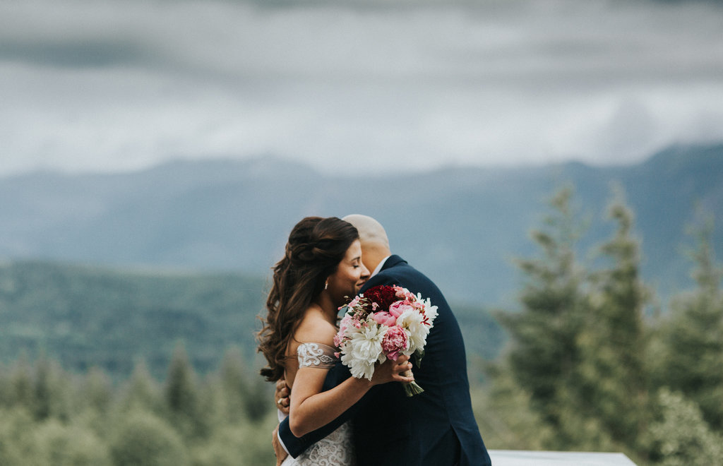 Bride and Groom embrace after their elopement ceremony in the Olympic National Park in Port Angeles, Washington.