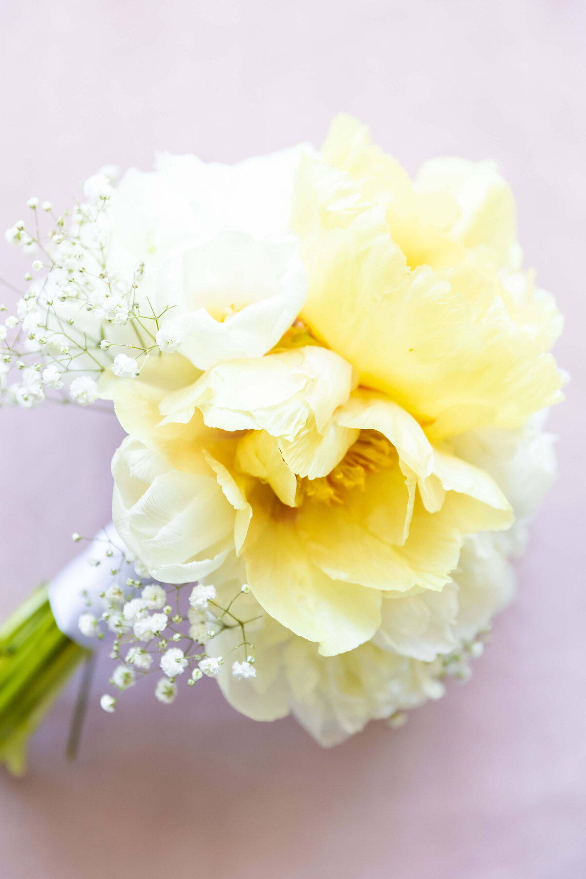 Yellow florals with babies breath designed by the Flower Smithy