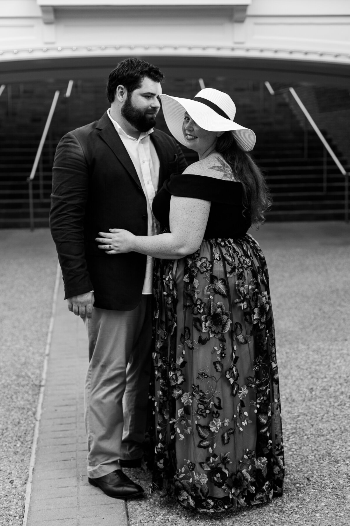 Black and white engagement photo of couple at Disney