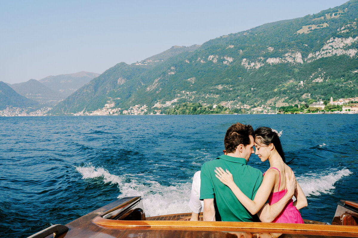 Boat ride engagement session on Lake Como in Italy photographed by Lake Como Photographer