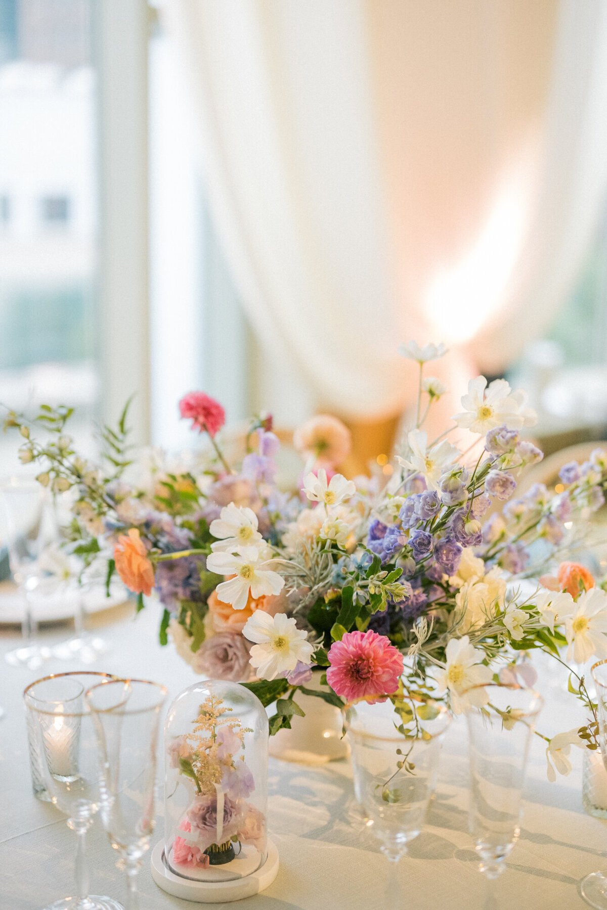 A luxurious wedding reception at The Peninsula Chicago with floral design by Life in Bloom.