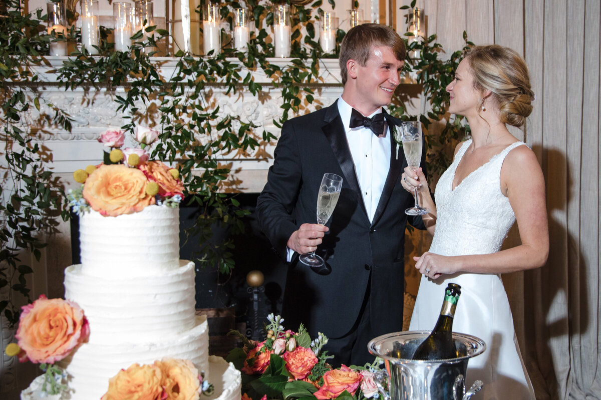 Bride and Groom cut Cake at Piedmont Driving Club Wedding