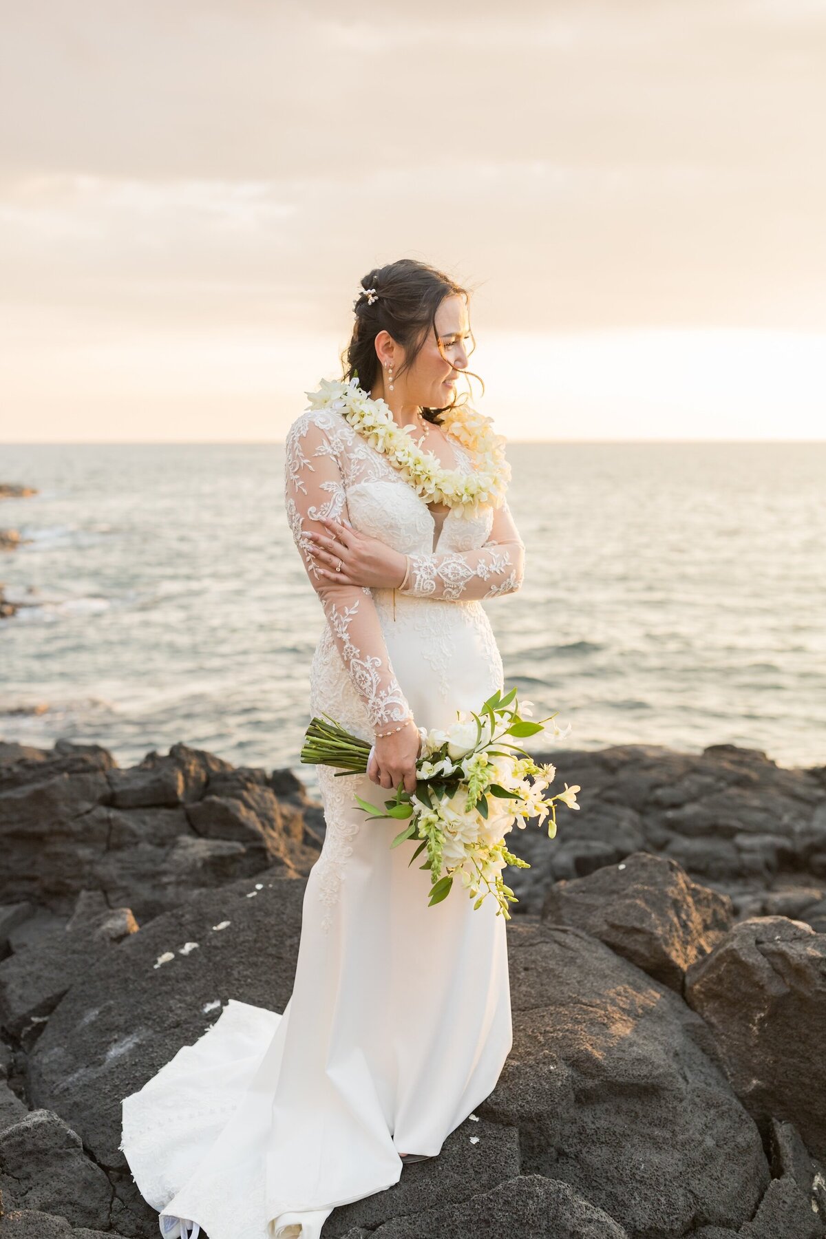 Big Island Wedding Photographer photograph of bride standing on Lava rock