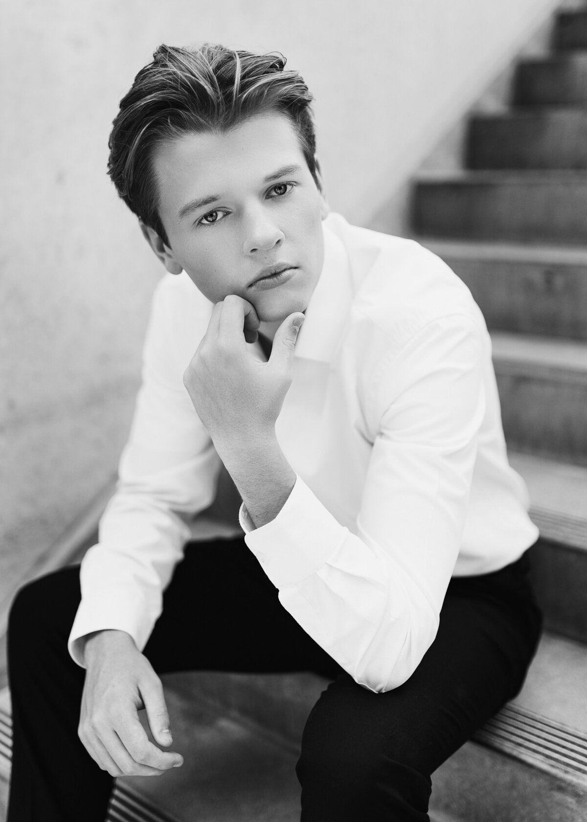black and white formal senior portrait of guy in minneapolis