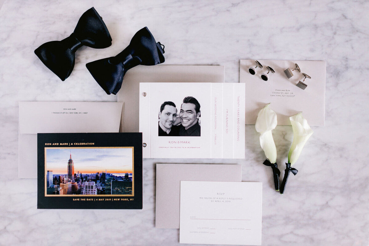 Invitations, bow ties,  and boutonnières for the grooms in The Skylark, New York. Wedding Image by Jenny Fu Studio