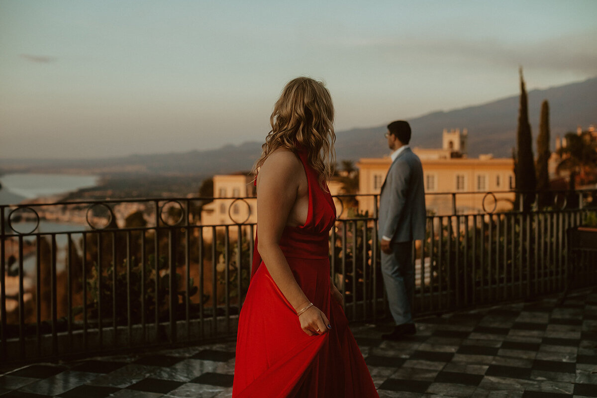 taormina engaged couple wearing red dress