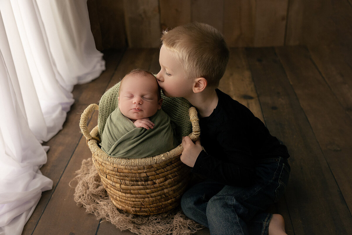 portrait of two brothers taken at hamilton newborn  photography studio