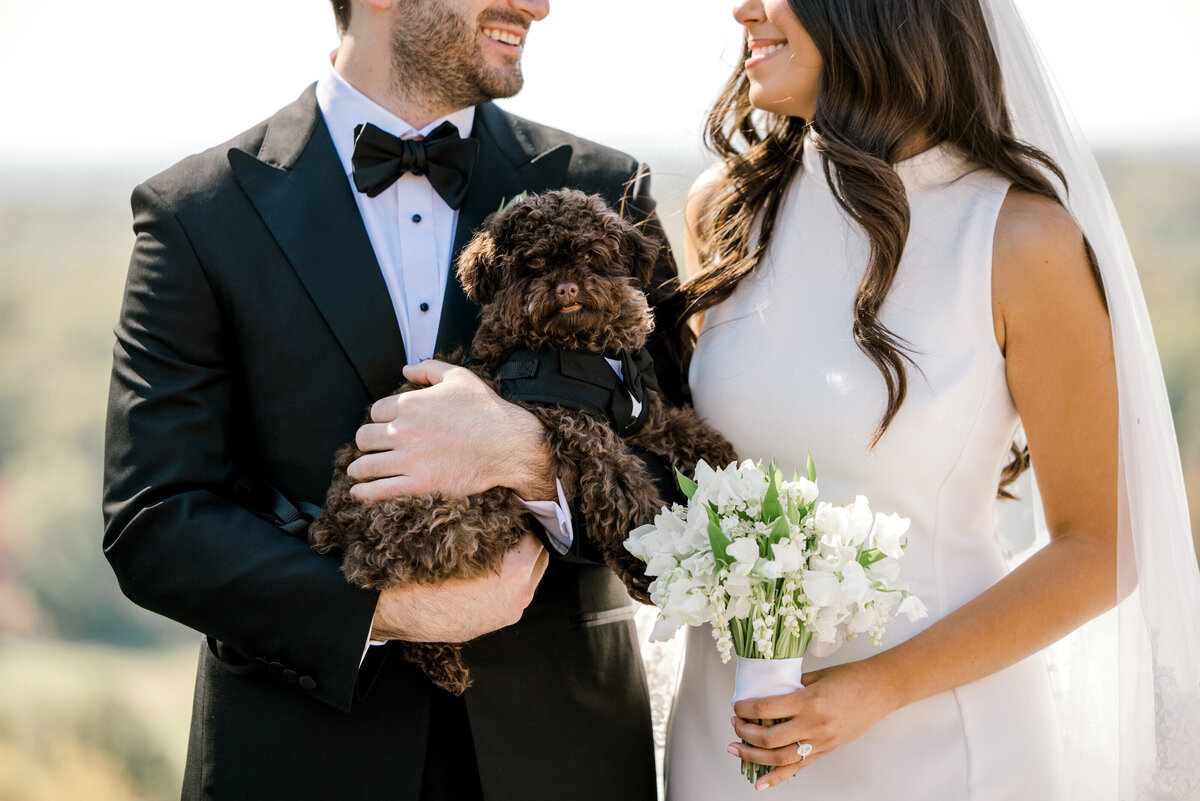 bride and groom and their dog at pendry natirar mansion