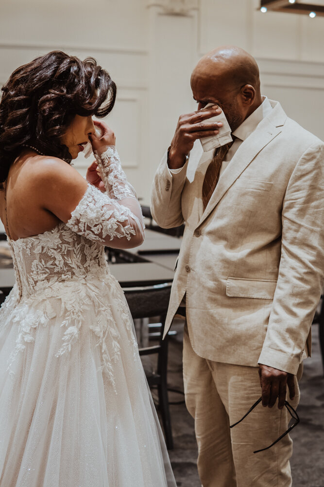 emotional-first-look-bride-and-dad-surety-hotel-des-moines-iowa-storyteller-collective-photo-co