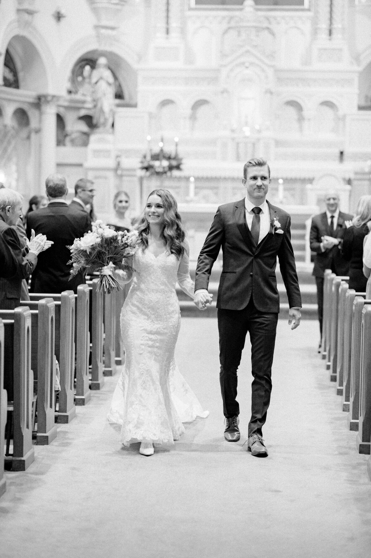 Mr and mrs walk down the aisle
