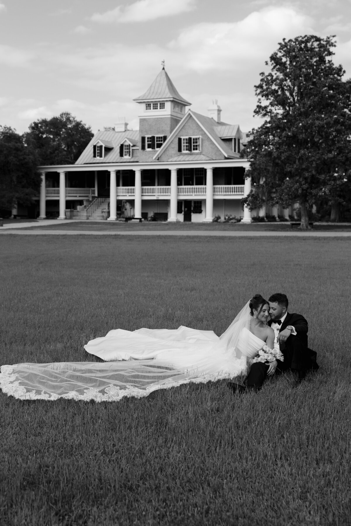 Bride and groom walking through the gardens at Middleton Place during golden hour