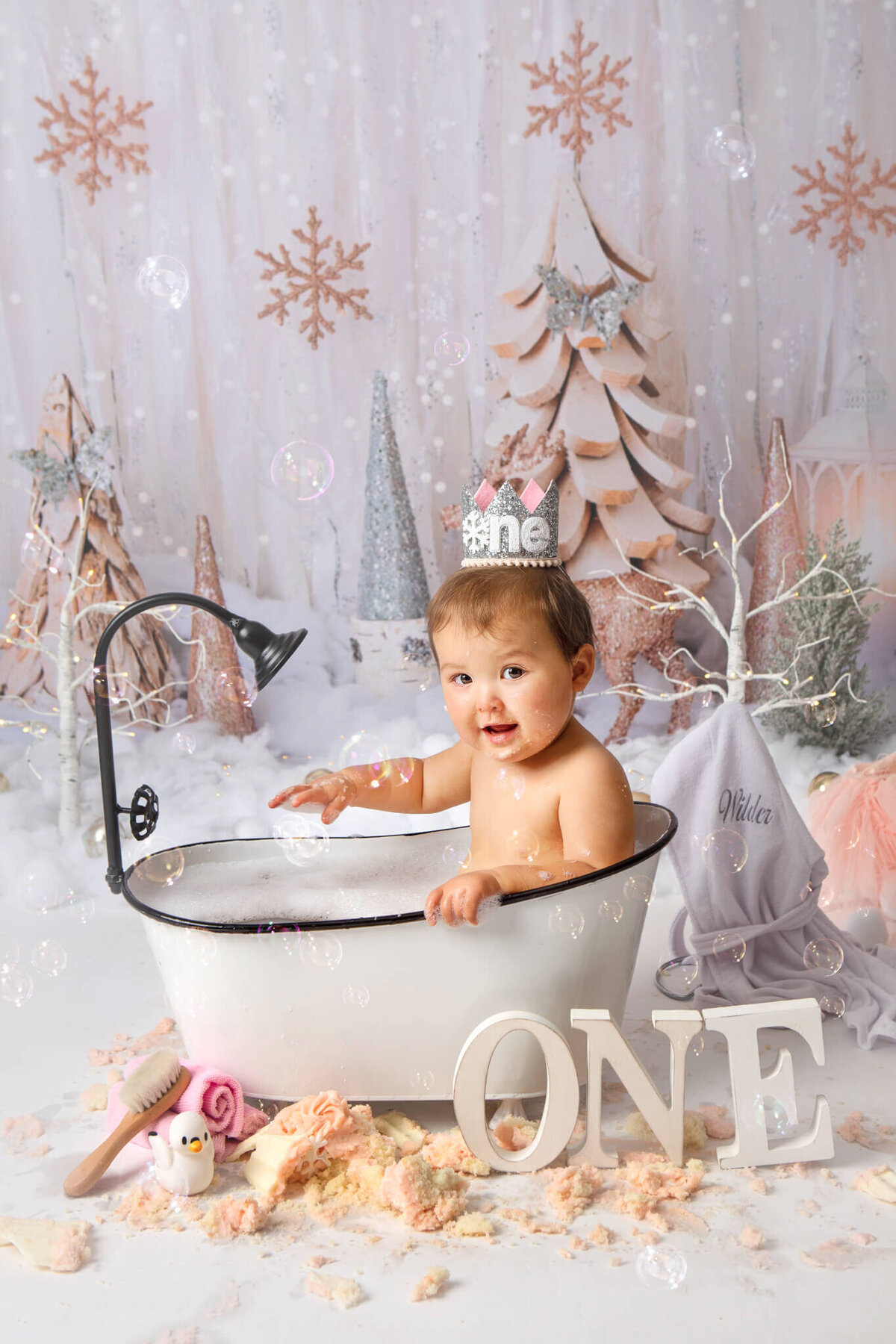 Los Angeles cake smash photoshoot with little girl sitting in bath tub  - Los Angeles Newborn Photographer