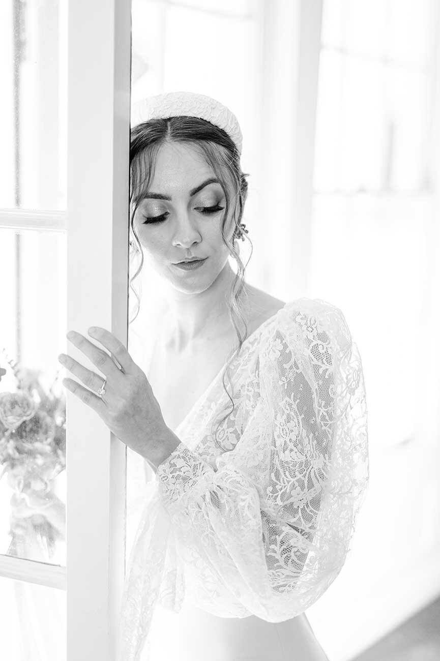 Black and white photography bride getting ready