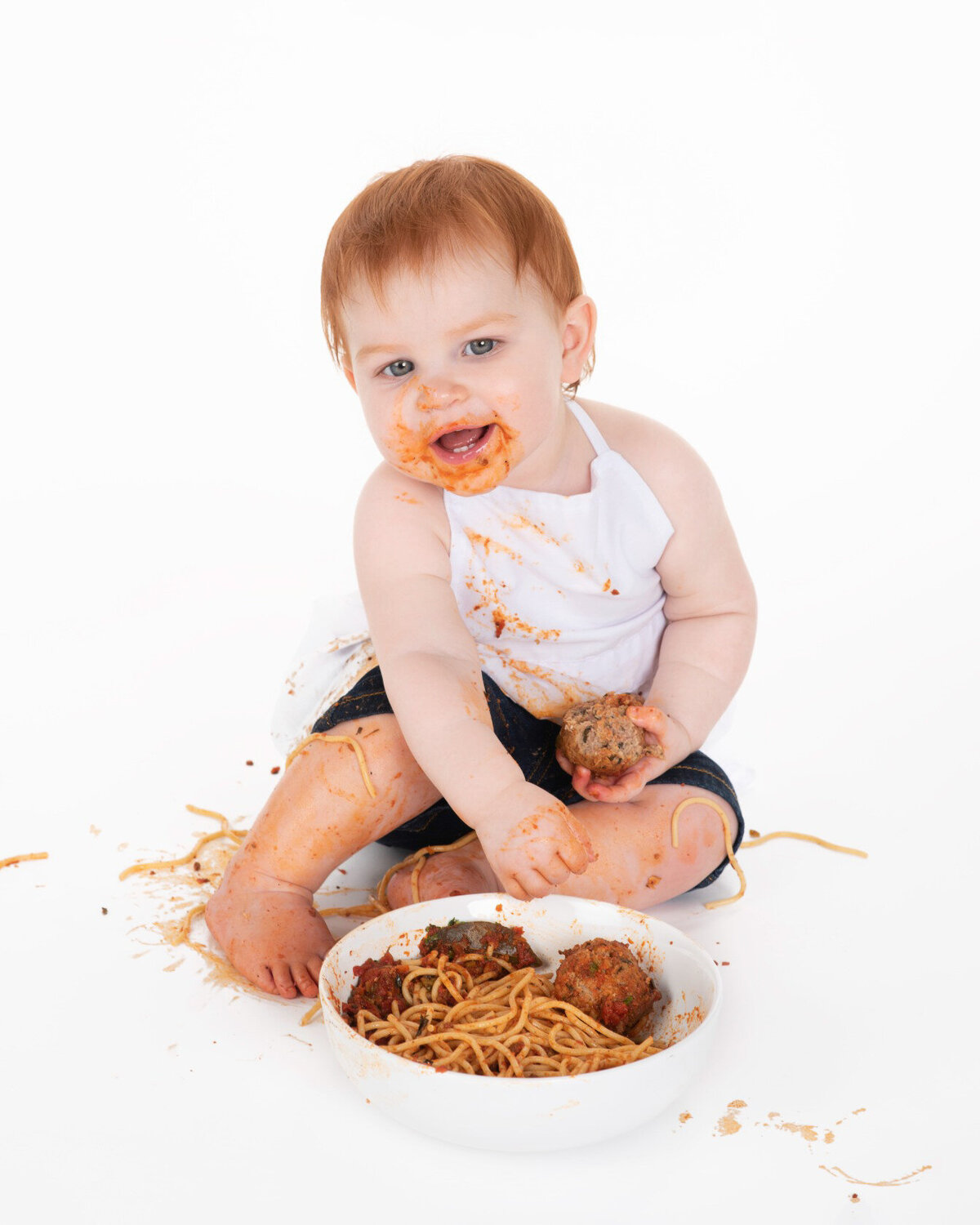 Spaghetti and meatballs baby cake smash photoshoot in Houston