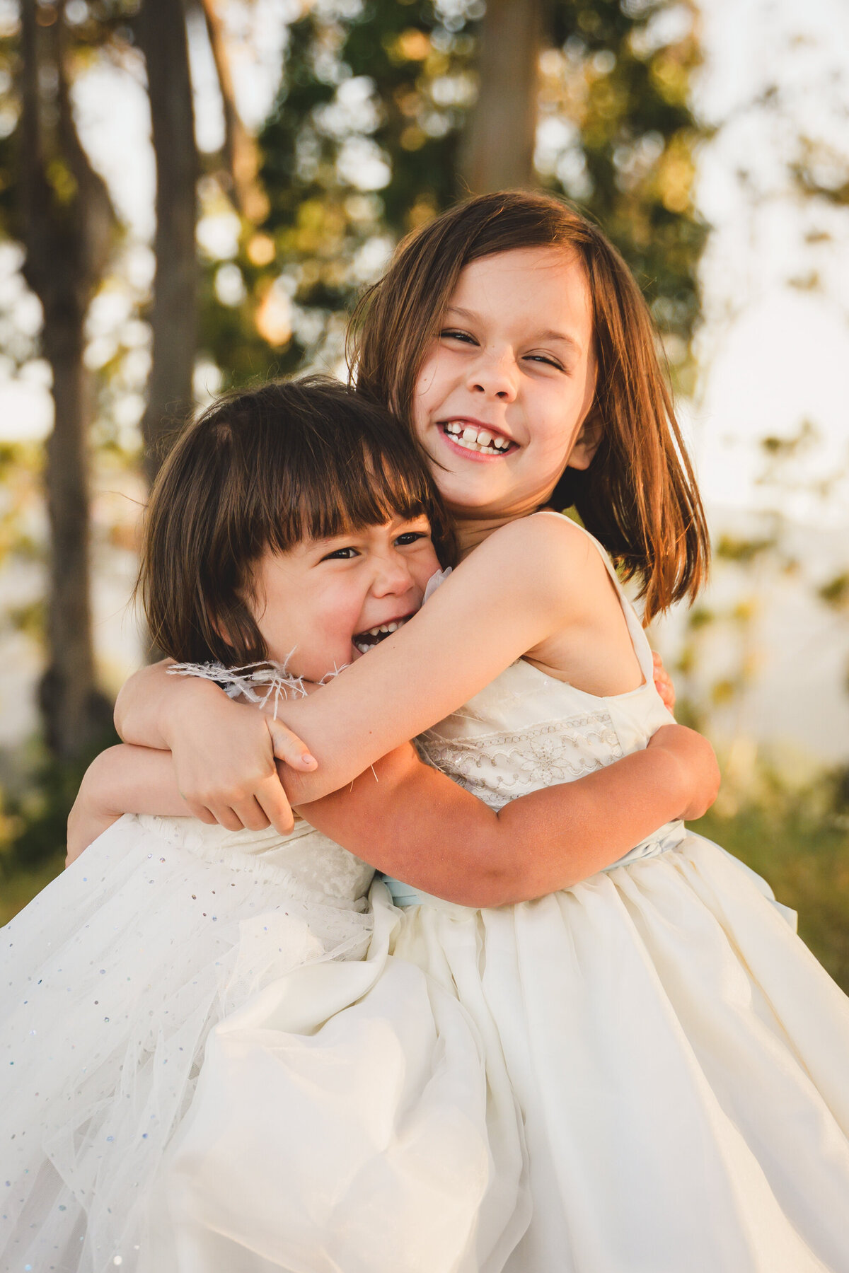 Outdoor sibling portrait — joyful family photography in natural Bay Area light