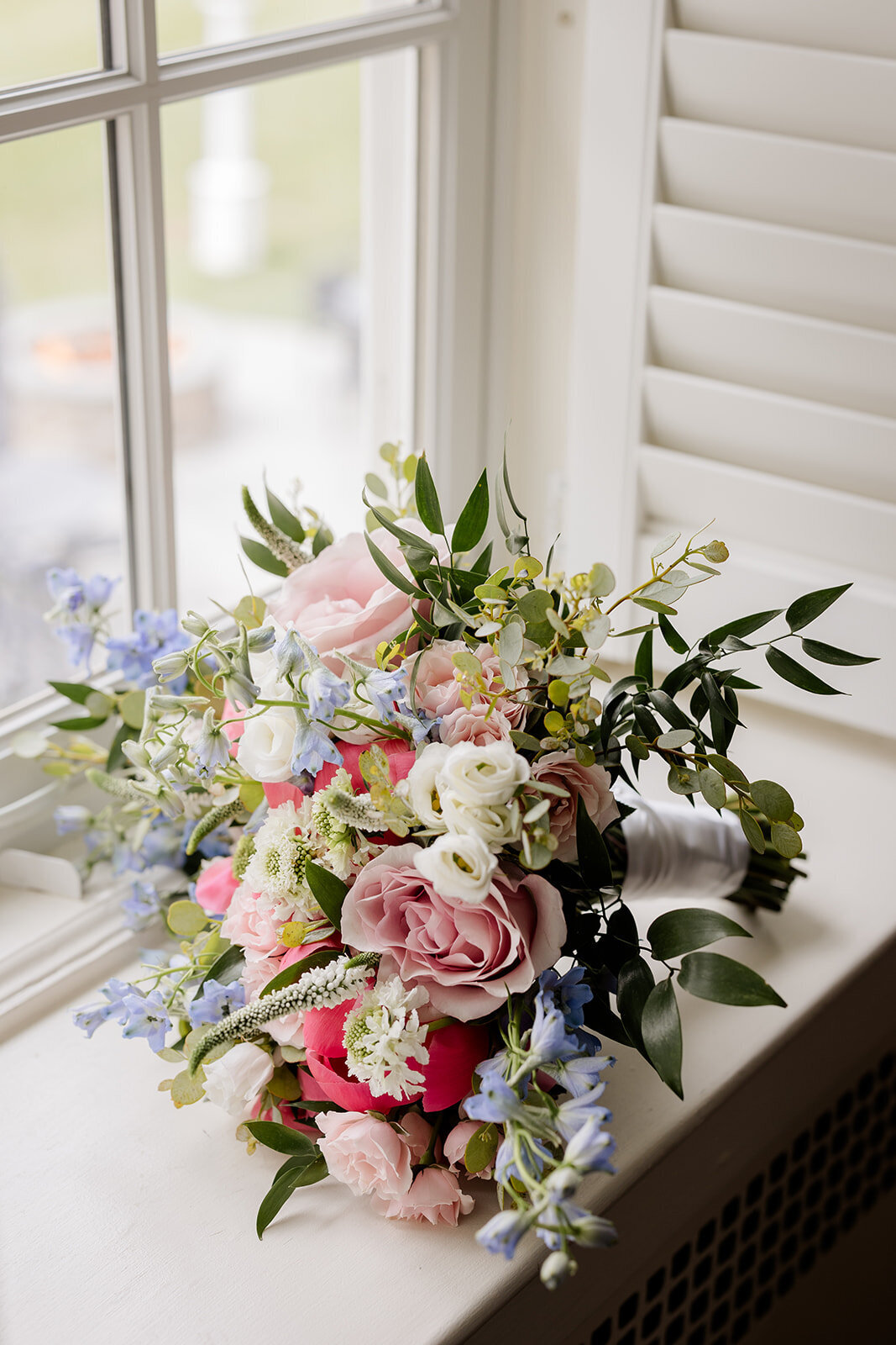 flower bouquet on a window sill