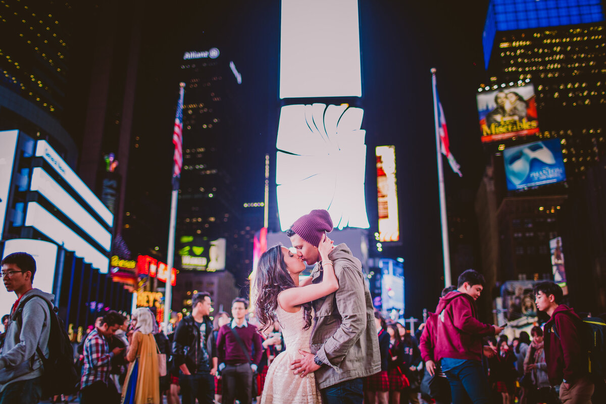 A couple kissing in the middle of times square