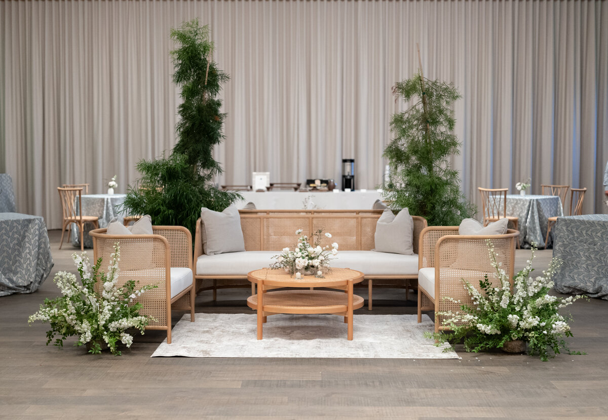 theoni stella furniture set up in glass barn at stanly ranch for modern destination wedding