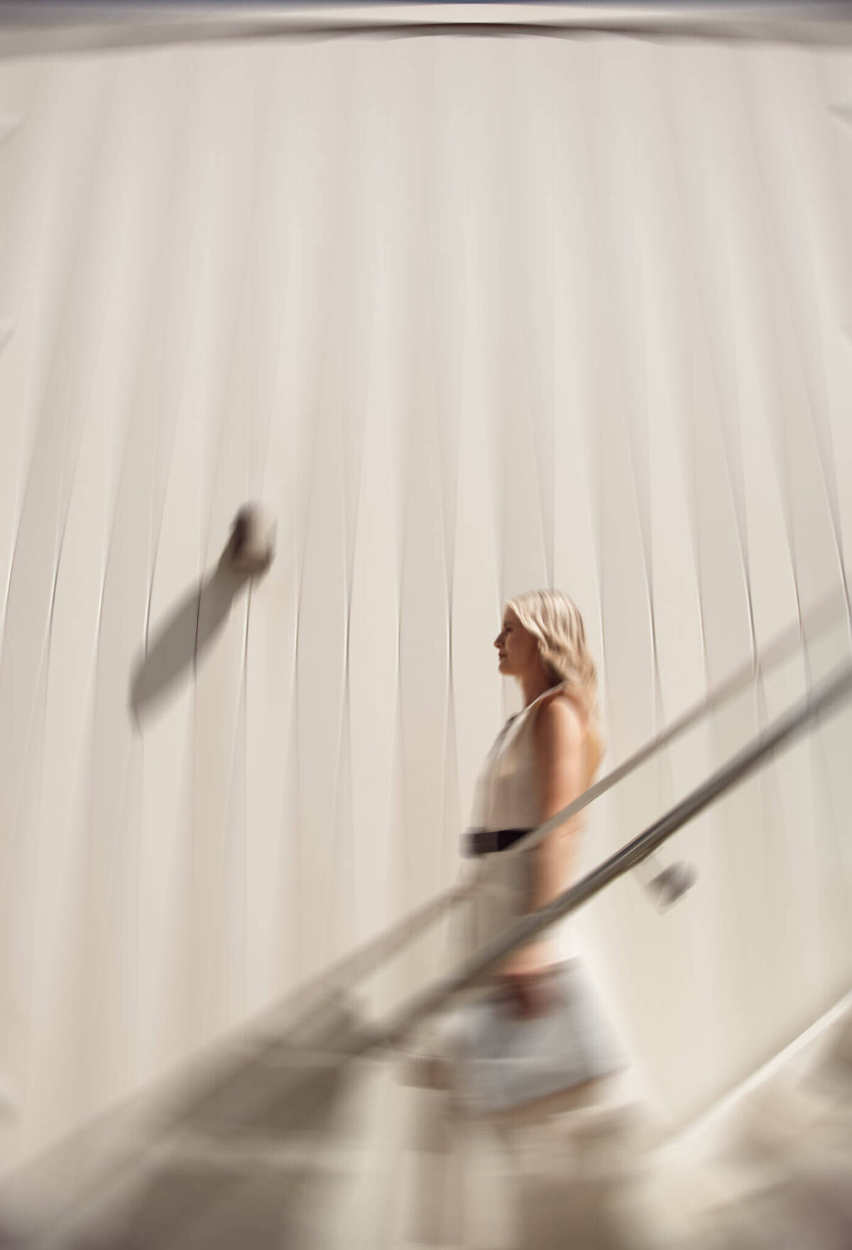 Selena walking down the stairs