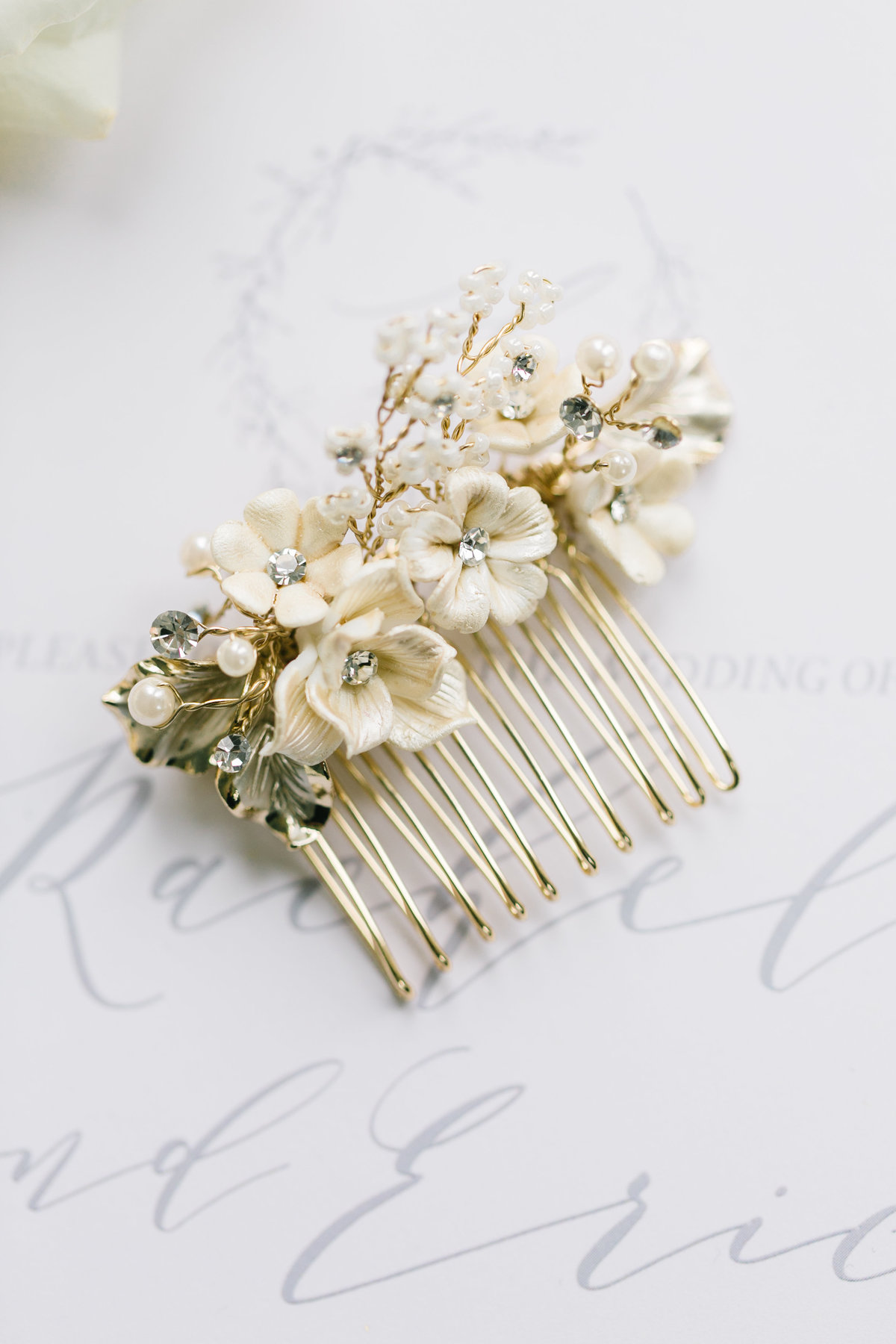 bridal hair clip with ivory flowers and greenery