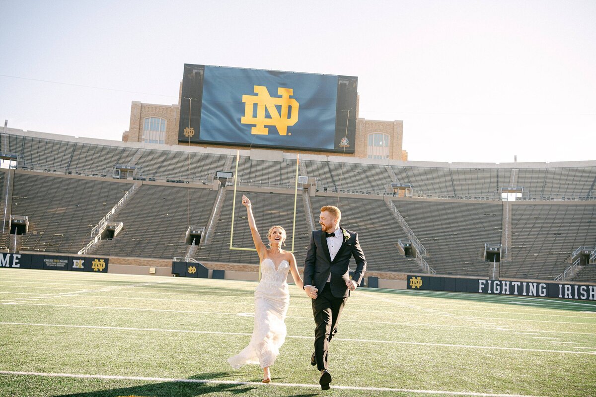 Bride and Groom on the Football field of Notre Dame