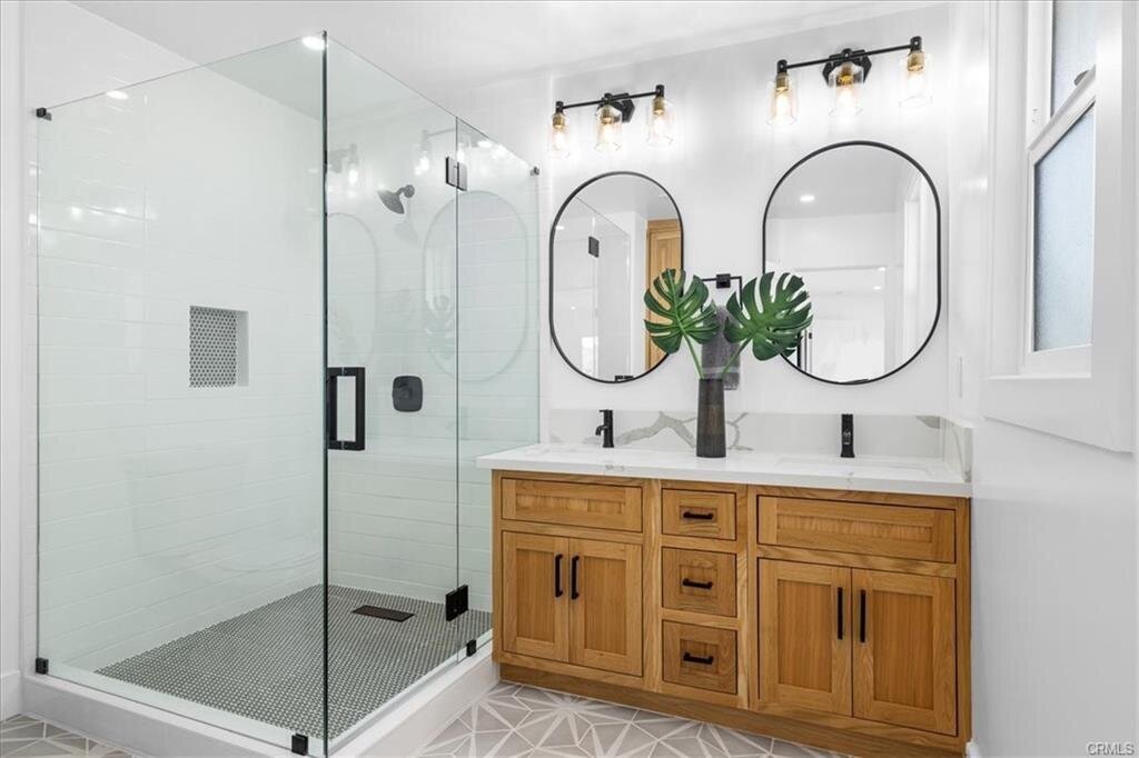 modern-white-bathroom-glass-shower-black-fixtures