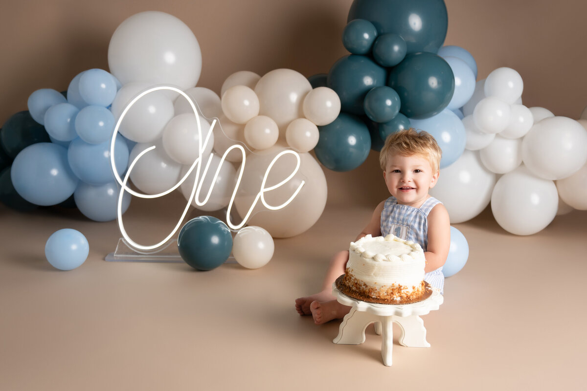 Baby Easton James celebrating his first birthday with a classic cake smash photoshoot in Houston by Lissette G Photography