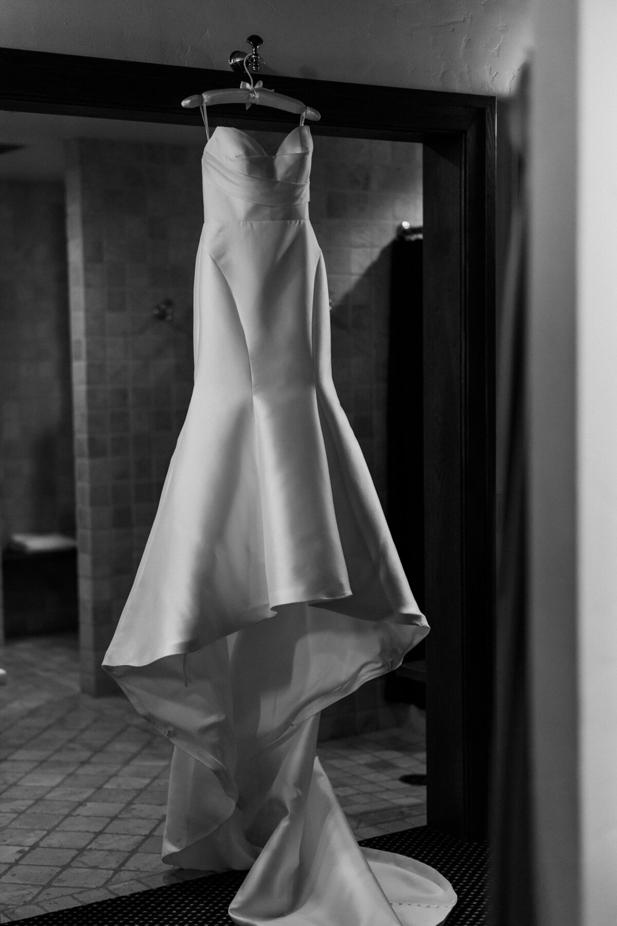 19-wedding-dress-hanging-in-doorway