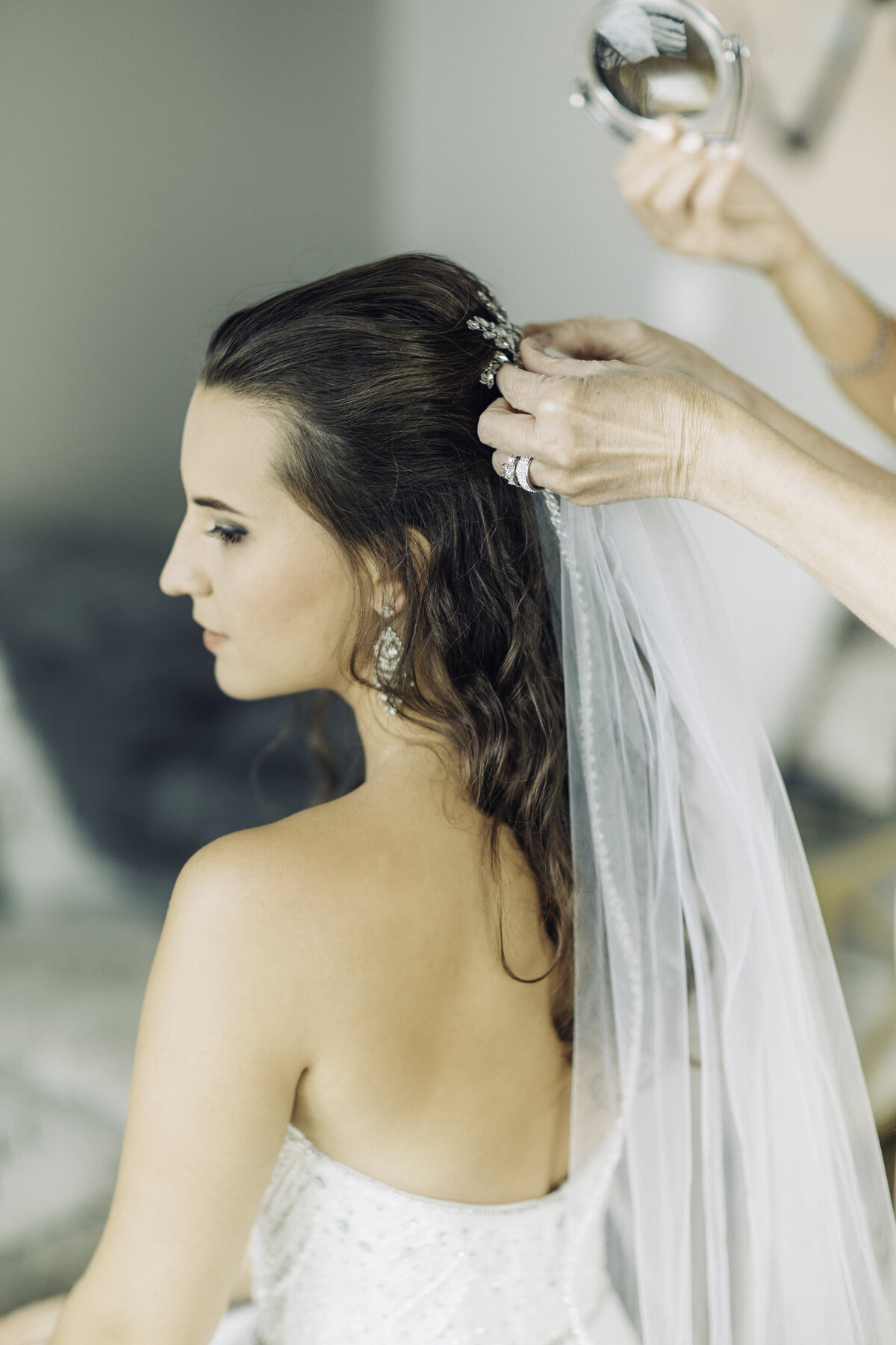 Wedding Photograph Of Bride Having Her Veil Fixed Los Angeles