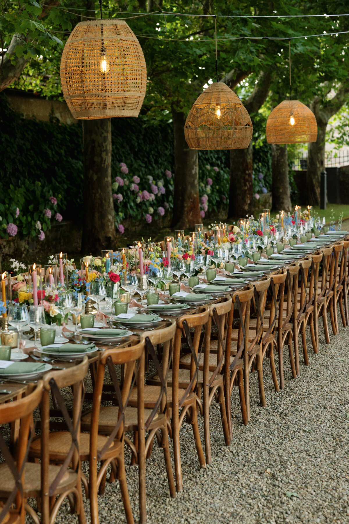 Dinner setup at sunset with long tables for the guests