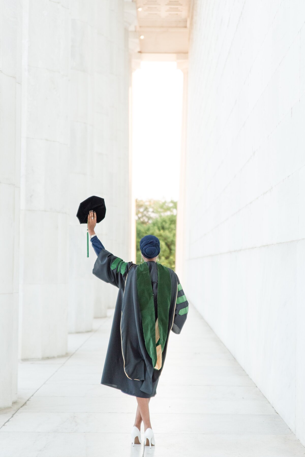 grad med school holding cap