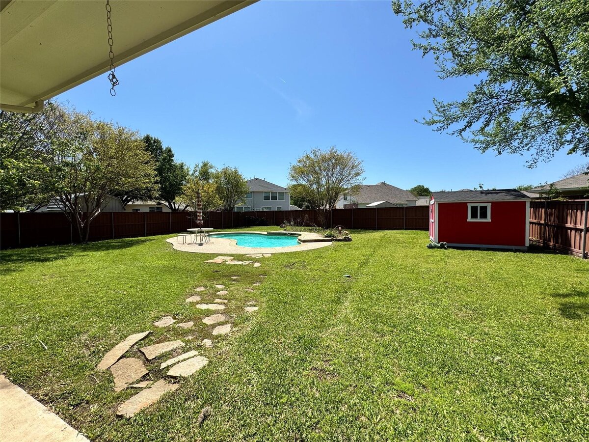 In-ground pool at 3 bedroom home for sale in Terrell, Texas