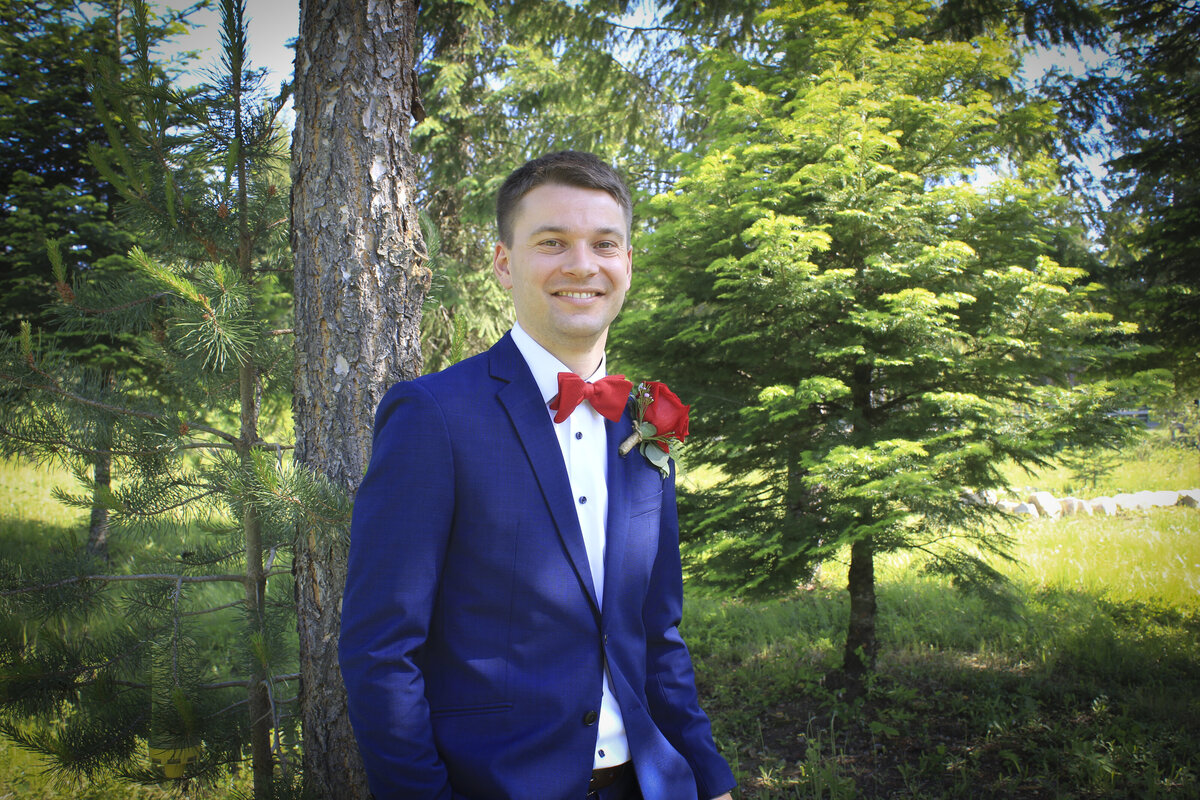 Groom in forest setting