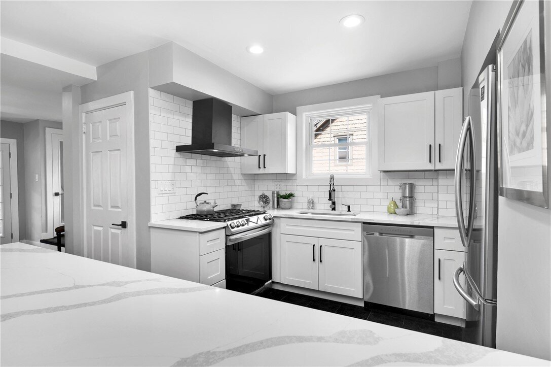 Modern kitchen staging highlighting open-concept living and buyer-focused design