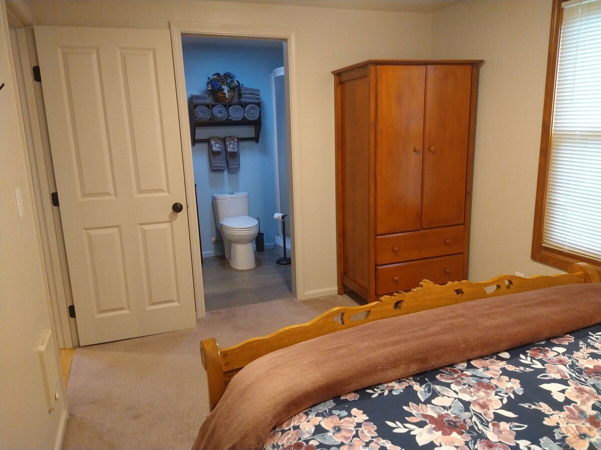 View of private bathroom off bedroom.