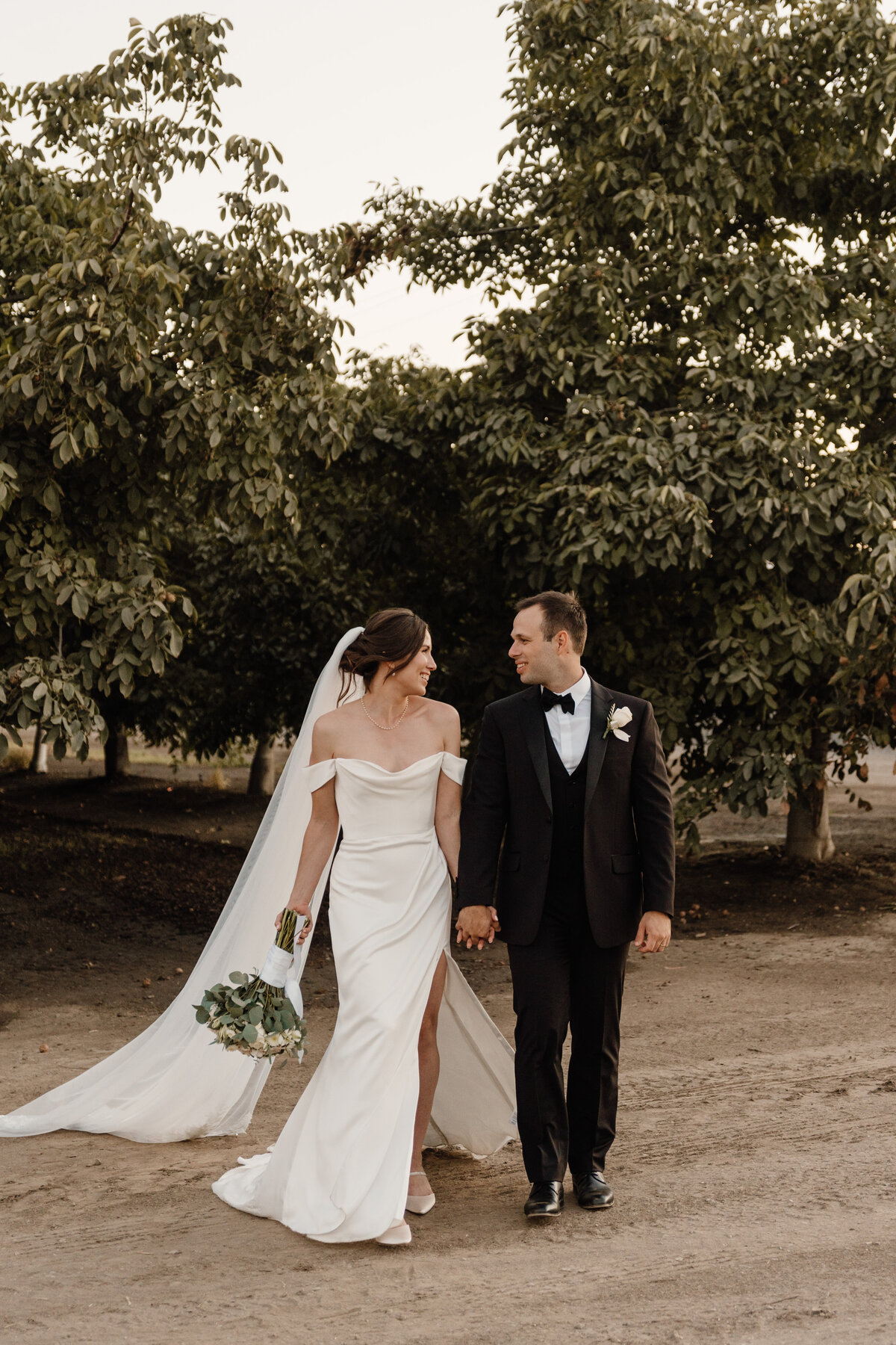 bride and groom walking on wedding day