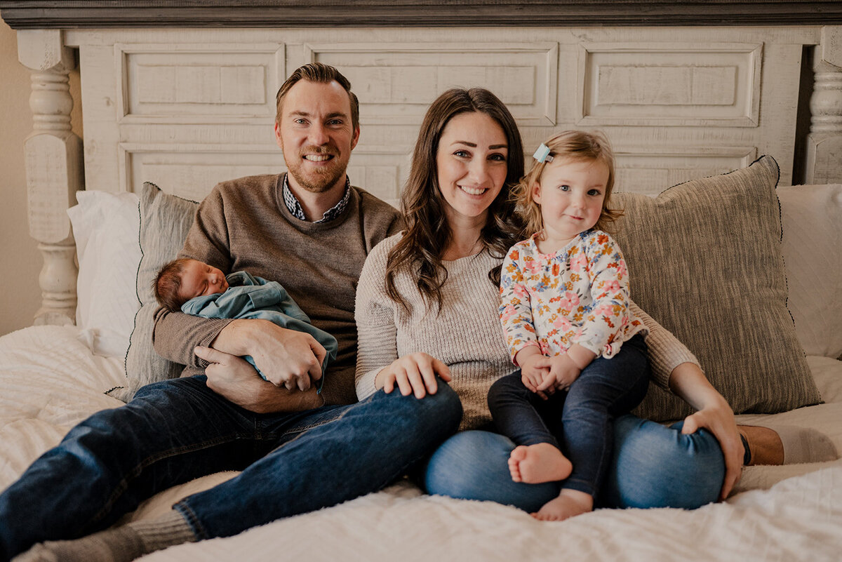 Loveland Newborn Photographer takes photos of the whole family