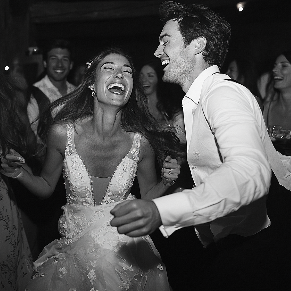 kdurski_86694_a_bride_and_groom_dancing_and_laughing_with_weddi_acda28fa-4fca-4fe3-a975-0c0e46a7281f