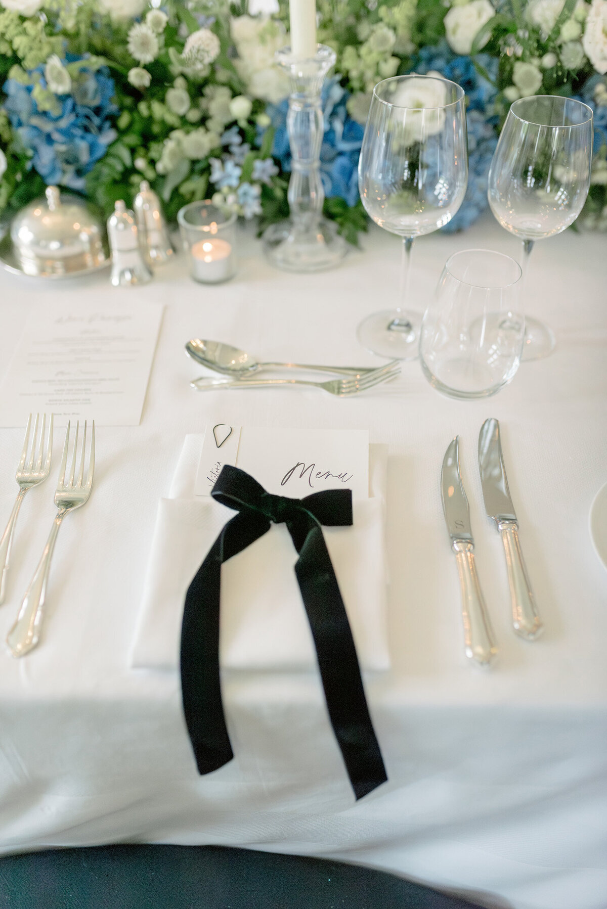 Velvet bow table settings on a Gleneagles wedding day. Image by award winning luxury wedding photographer Scotland, Jill Cherry Porter.