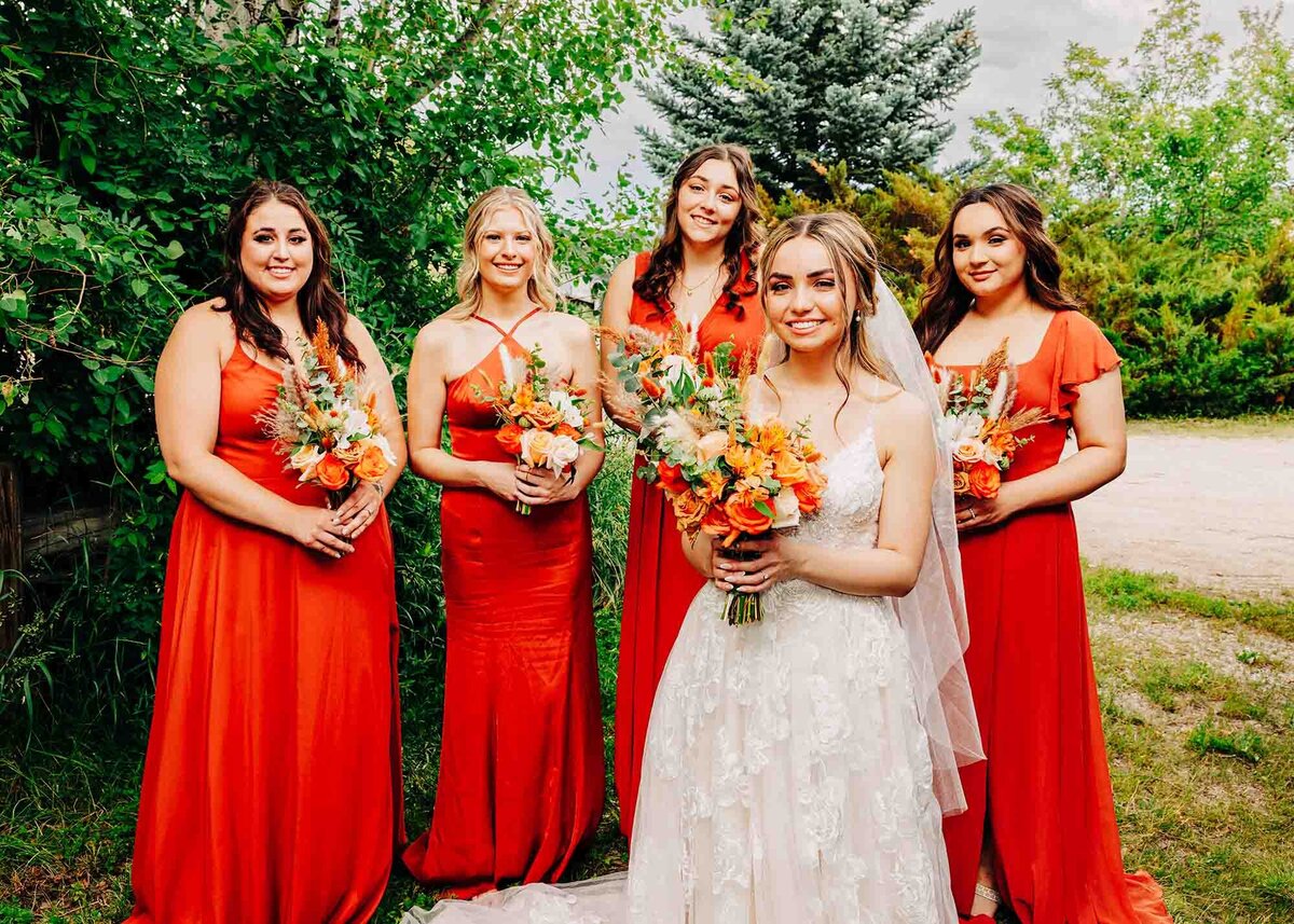 Bride with bridesmaid at Shades of Green Events in Helena, MT