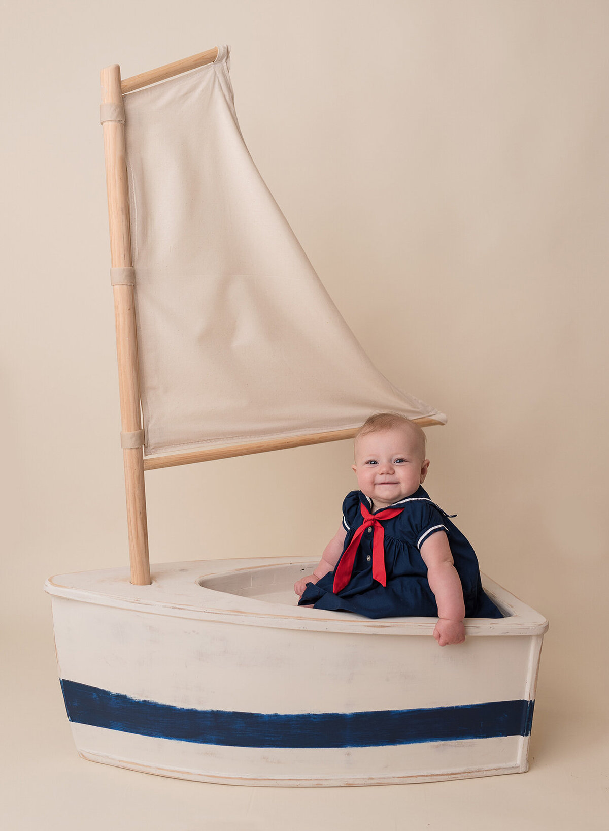 Cute Little baby photo in a creative boat